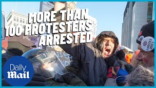 Freedom Convoy Police arrest over 70 protestors in Ottawa at truckers protest [upl. by Dihahs]