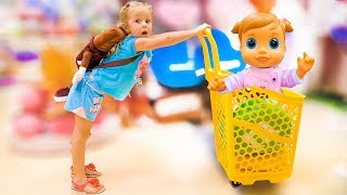 Nastya and baby doll doing shopping  song for kids Nursery Rhyme by Nastya at the candy shop [upl. by Inanak]