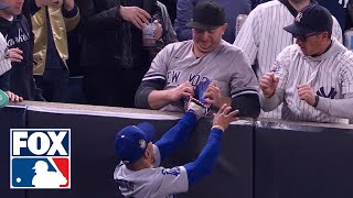 Yankees fan pulls ball out of Mookie Betts glove in World Series Game 4  MLB on FOX [upl. by Ivgnout]