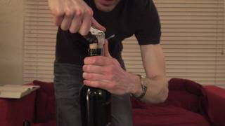 5 How to Open a Bottle of Wine with a Waiters Corkscrew  SuppleWinecom [upl. by Sirovat]