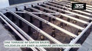 Eine Terrasse mit Holzdielen und einer Aluminium Unterkonstruktion selber im Garten bauen [upl. by Arick233]