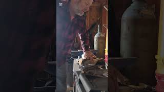 Alaska installing wood stove in barn and making a pipe collar from tin cans [upl. by Etnoved]