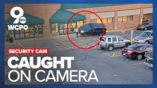 Surveillance cam catches moment woman crashes her vehicle into two men at Kroger [upl. by Anilat]