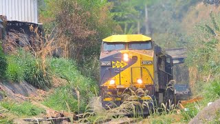 Trem de carga com vagões plataformas KPC subindo a Linha do Centro com dupla de Locomotivas Dash9 [upl. by Aohk]