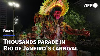 Thousands celebrate Rio de Janeiros carnival with glitzy parade  AFP [upl. by Simonne356]