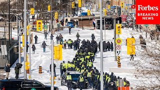 BREAKING ‘Freedom Convoy’  Ottawa Police Arrest 15 Protesters And Tow Away Vehicles [upl. by Nalliuq]