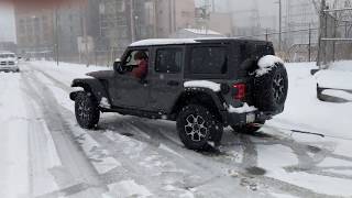 2018 Jeep JLU Rubicon on ice pulling a Semi out of a ditch [upl. by The]