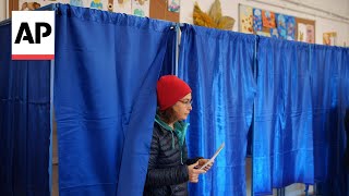 Polls open in Romania in first round of presidential election [upl. by Noirad649]