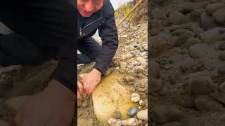 precious stone found in the river bank shortvideo [upl. by Kerman]