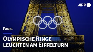 Olympische Ringe leuchten am Eiffelturm  AFP [upl. by Monetta]