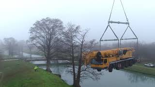 Watch TNTs Manitowoc 18000 Lifting Another Crane Across a Canal [upl. by Naret396]