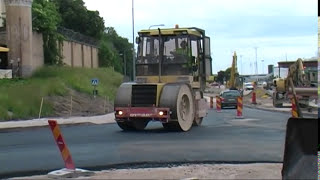 Scania och Volvo lastbilar transporterar asfalt till vägbygge i Visby hamn 2012mpg [upl. by Bidle]