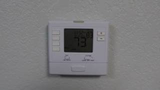 Program Your T705 Programmable Thermostat [upl. by Anitselec]