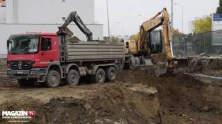 Wheel excavator CAT M318C digging and loading dirt to MercedesBenz ACTROS 4144 dump truck [upl. by Baer222]