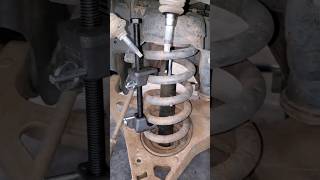 Mechanic Tip Compressing Coil Springs [upl. by Messab]