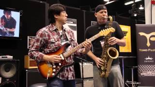 AMAZING guitar and sax duet at NAMM 2014  Stevie Wonders Jesus Children [upl. by Scuram343]