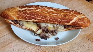 Beefsteak sandwich on uniflame 36inch gas griddle [upl. by Irrac]