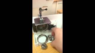 How to pull apart and reassemble the bobbin case area on a front loading sewing machine [upl. by Dominy66]