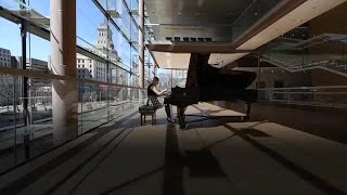 She plays piano using two baseballs and a glove [upl. by Leboff]