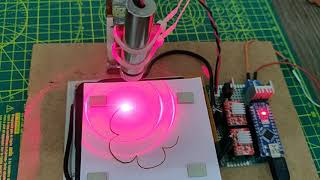 DIY Arduino CNC Laser paper cutter from DVD Drive [upl. by Inalaehon]