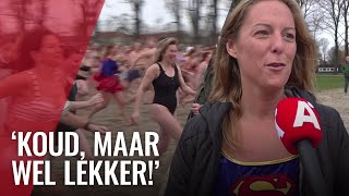 Historisch warme nieuwjaarsduik in Sloterplas [upl. by Rocco]