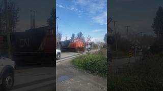 Couple of CN Trains Blasting Some Grade Crossings [upl. by Yenitsed]