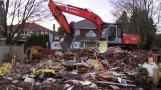 Hitachi Excavator At WorkBreaking up Demolished House DebrisBC [upl. by Laban82]