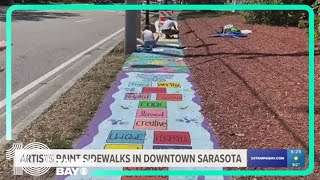 Local artists working together to beautify Sarasota area by painting sidewalks [upl. by Ahsikram459]