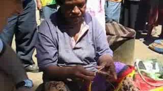 Woman knits a Billum traditional bag in Papua New Guinea [upl. by Karla686]