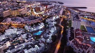 Drone view of resorts near Playa de Fanabe in Costa Adeje Tenerife Canary Islands [upl. by Rriocard]