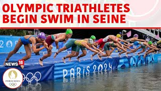 Olympic Triathletes Swim In Seine River After Days Of Concerns About Water Quality  N18G  News18 [upl. by Alysa]