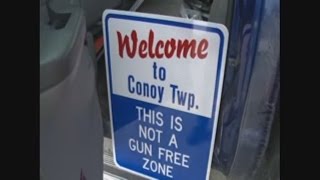 Officials put up not a gun free zone signs around town [upl. by Gilroy]