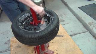 How to mount and balance a car tire yourself [upl. by Tillion]