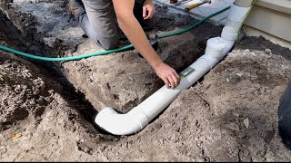 How To Install A 4quot PVC Downspout Drainage System That Works [upl. by Aihsenot]