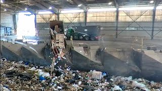 Garbage trucks dumping in transfer station pit [upl. by Clerk]