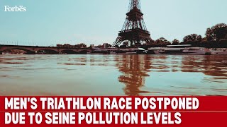 Paris Olympics Mens triathlon race postponed due to Seine pollution levels [upl. by Eelanna]