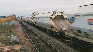 GBRF liveried 66730 Whitemoor and 66756 Royal Corps of Signals heading through Whittlesea Station [upl. by Norab]