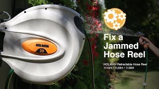 How to Fix a Jammed Holman Retractable Hose Reel [upl. by Dewain]