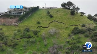 Giant crack forms in ground on hillside in Brentwood neighborhood [upl. by Remmer]