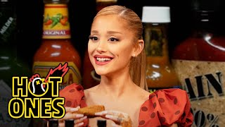 Ariana Grande Hits a High Note While Eating Spicy Wings  Hot Ones [upl. by Okimik]