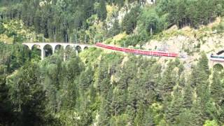 The Bernina Express crossing the Landwasser Viaduct near Filisur [upl. by Edeline]