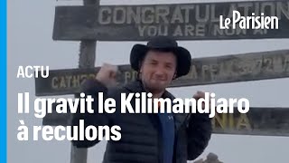 Kilimandjaro  un Britannique a gravi et descendu le sommet à reculons en hommage à son grandpère [upl. by Rusel]