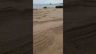 Sand formations created by the storm sand river riverside storm shorts shortvideo [upl. by Sergent]