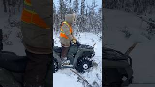 Winching frozen snowmobile with quad [upl. by Ruel]