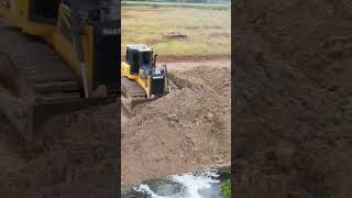 SHANTUI dozer pushing soil into water [upl. by Evol999]