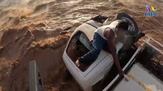 Sheldrick Wildlife Trust pilots rescue a driver on the verge of being swept away by water [upl. by Nosloc647]