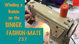 Winding the Bobbin on a Singer FashionMate 237 Sewing Machine [upl. by Yrogiarc]