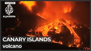 Lava pours from Canary Islands’ volcano villages evacuated [upl. by Banquer]