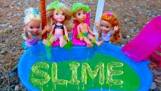 Elsa and Anna toddlers slime in the pool [upl. by Annalee248]