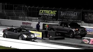 Tuned CTSV vs Supercharged TRD Tundra  14 Mile Drag Race Video  Road Test TV ® [upl. by Hannover299]